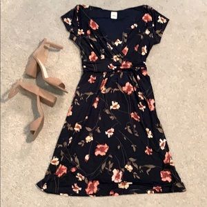 Cap sleeve navy floral print dress.